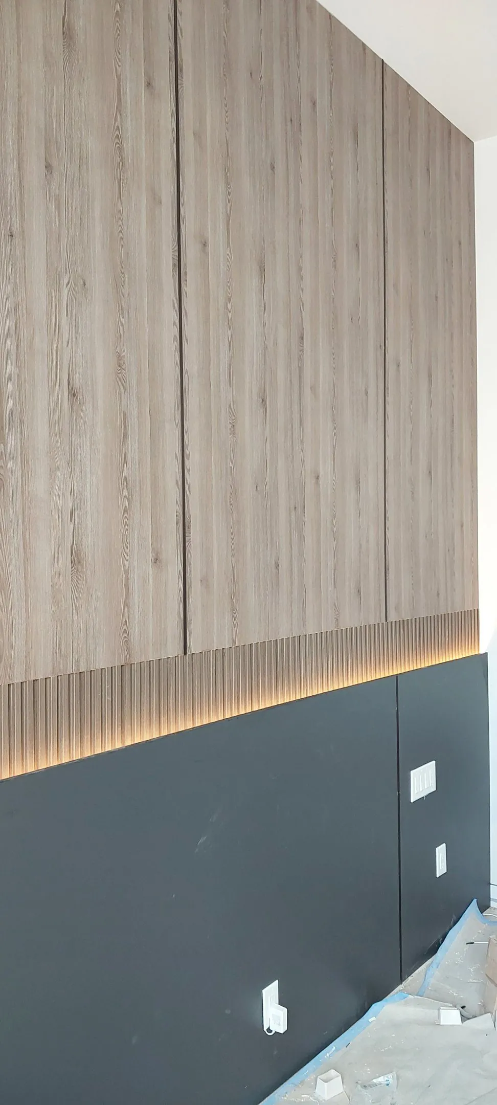 Linear LED detail under wood