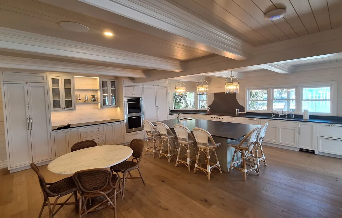 Kitchen with in-ceiling speakers in the shiplap ceiling
