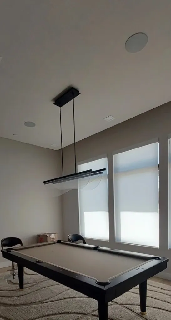 Game room with ceiling speakers